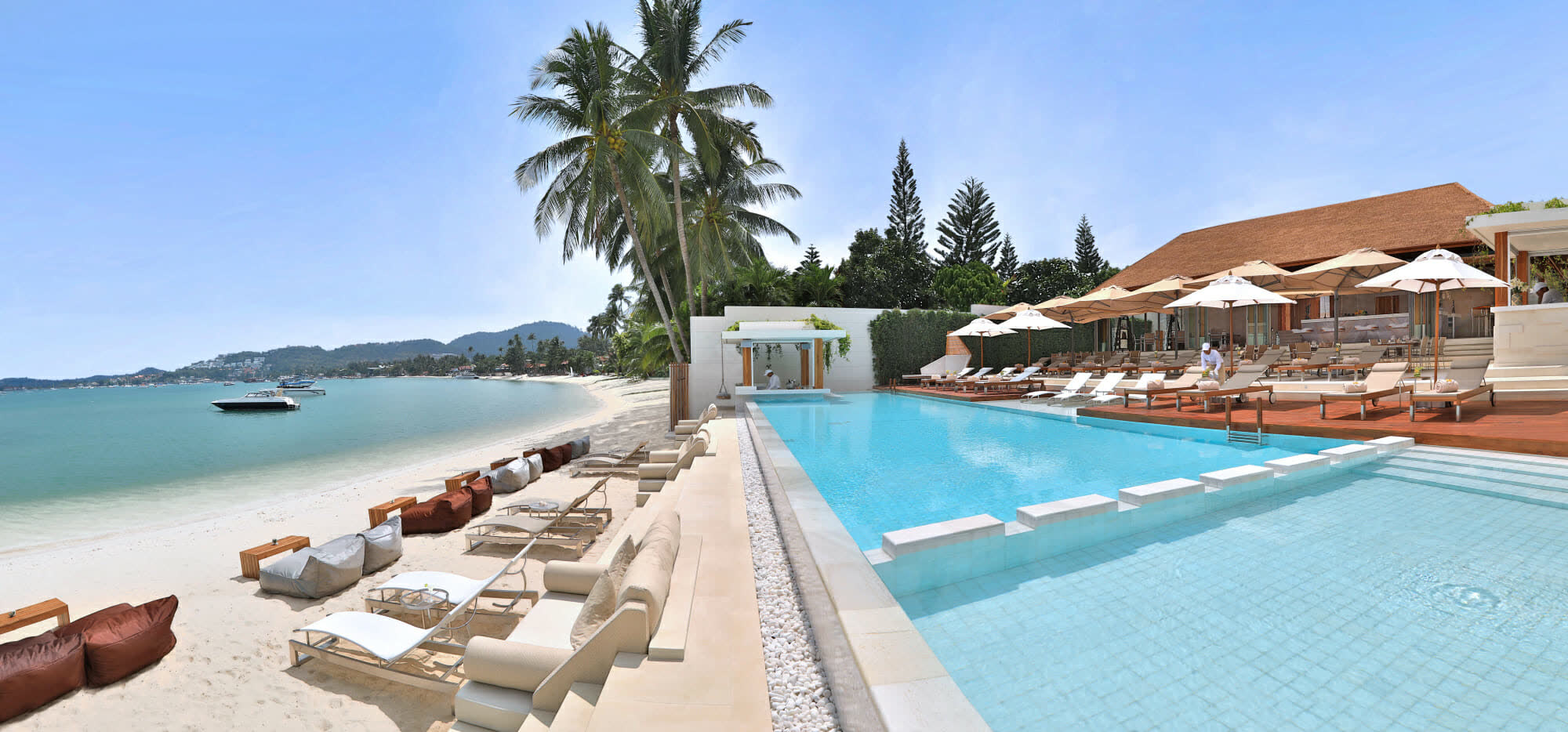 The beach, pool and pavilion at Chi Samui